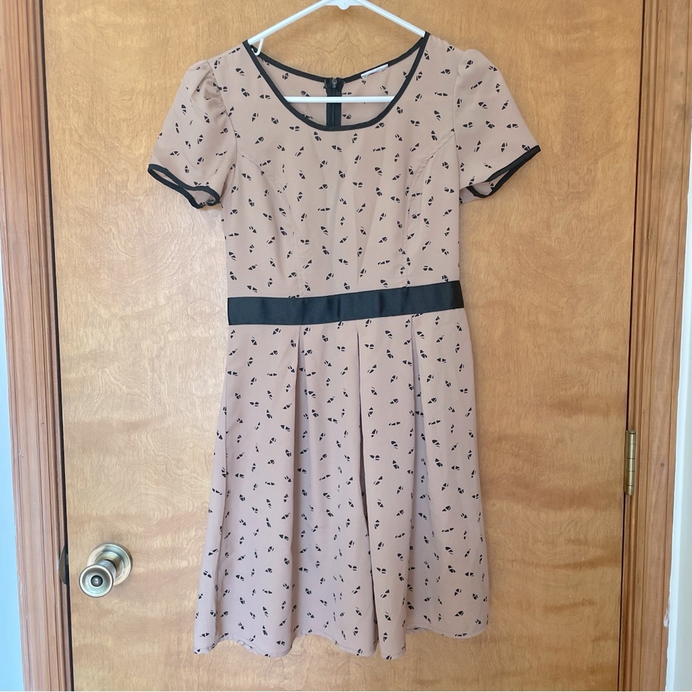 Elegant Tan Dress with Black Accents